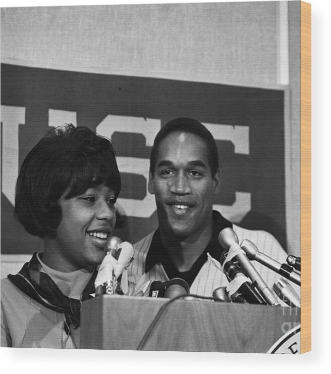 People Wood Print featuring the photograph Usc O.j. Simpson And Wife Margaret by Bettmann