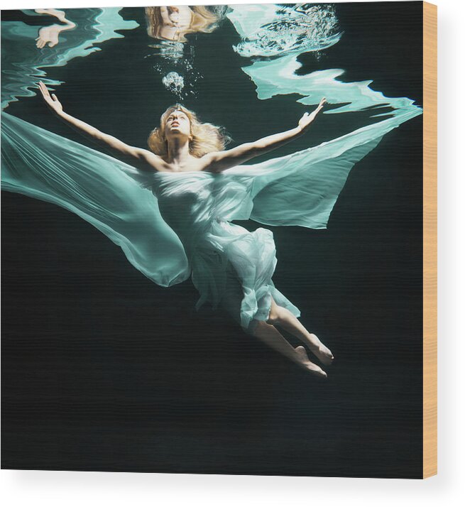 Underwater Wood Print featuring the photograph Woman Under Water Like An Angel by Henrik Sorensen