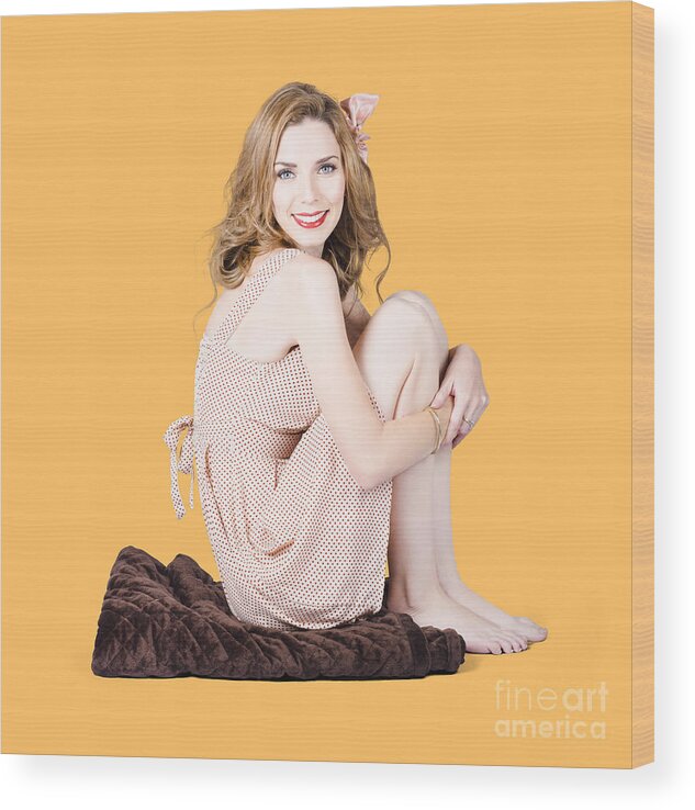 Beauty Wood Print featuring the photograph Isolated pinup girl sitting on soft blanket by Jorgo Photography