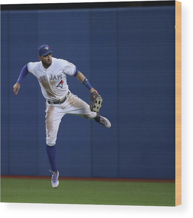 People Wood Print featuring the photograph Kevin Pillar and Jonathan Schoop by Tom Szczerbowski