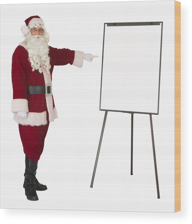 Whiteboard Wood Print featuring the photograph Santa Claus pointing to an isolated whiteboard by Leezsnow