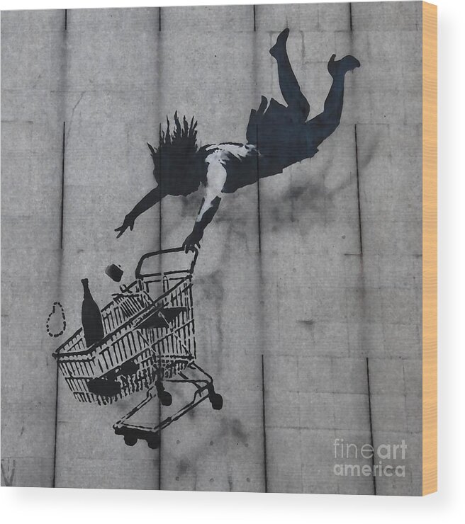 Banksy Wood Print featuring the mixed media Shop til you drop by Banksy