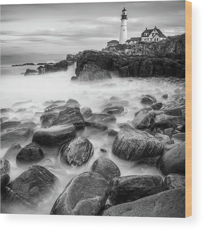 Waves Crashings Wood Print featuring the photograph Smooth Ocean Waters Over The Rocks Below Portland Head Lighthouse - Black and White by Gregory Ballos