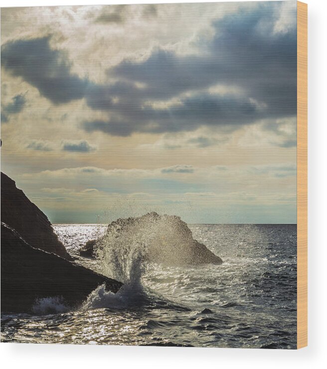 Wave Wood Print featuring the photograph Wave crashing on rocks by Fabiano Di Paolo