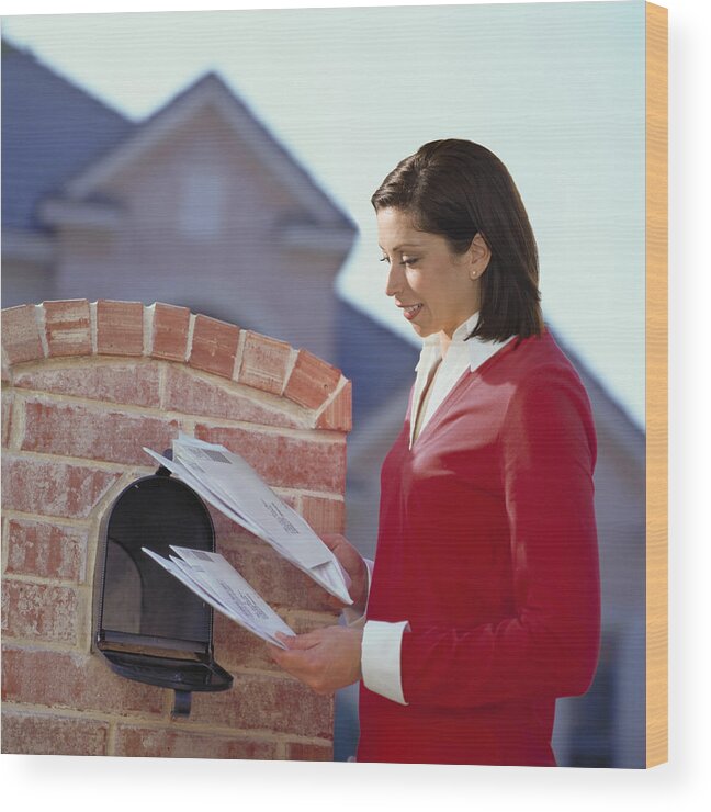 People Wood Print featuring the photograph Woman getting mail from mailbox by Steve McAlister