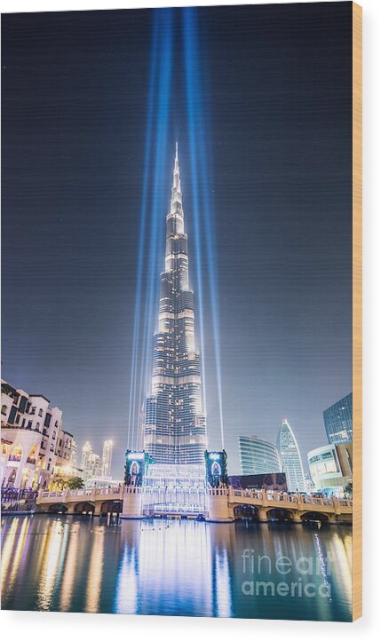 Dubai Wood Print featuring the photograph Burj Khalifa with light beams - Dubai - UAE by Matteo Colombo