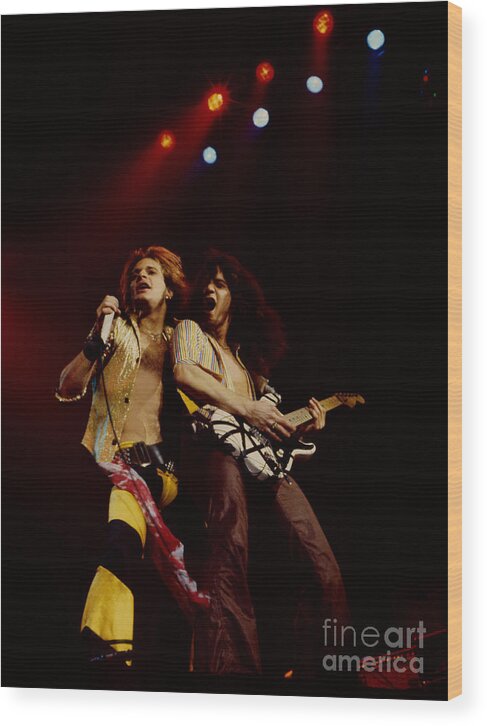 Van Halen Wood Print featuring the photograph David Lee Roth and Eddie Van Halen - Van Halen- Oakland Coliseum 12-2-78  by Daniel Larsen