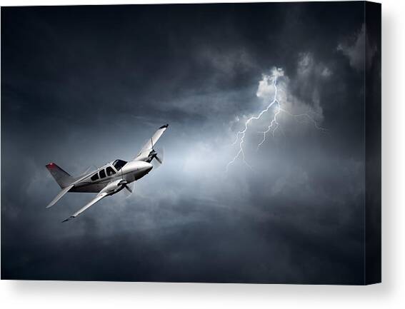 Risk - Aeroplane in thunderstorm Canvas Art Print by Johan Swanepoel