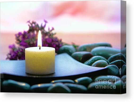 Serene Candle with Stones and Flowers Canvas Print