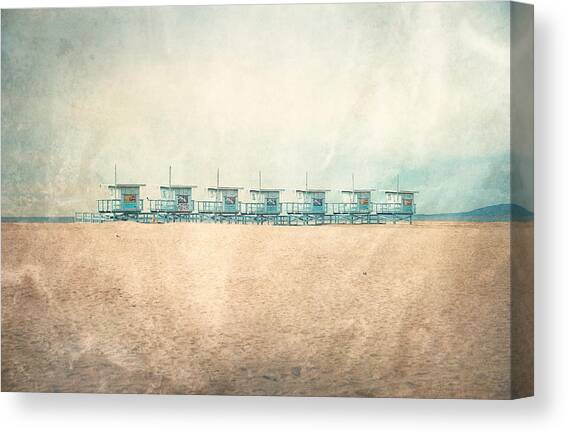 Row of Lifeguard Towers on Beach Canvas Print