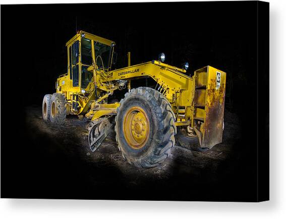 Caterpillar Grader Canvas Art Print by Paul Freidlund