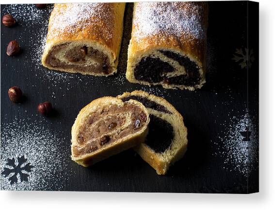 Hungarian Beigli With A Poppyseed And Hazelnut Filling For Christmas Canvas Art Print by Christian Kutschka