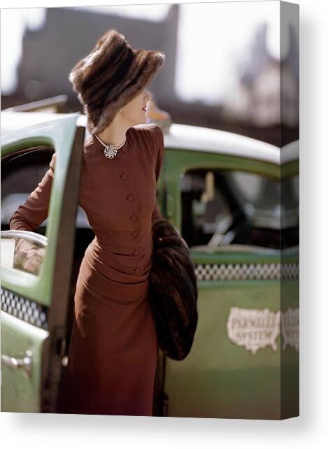 A Model Getting Out Of A Cab Canvas Art Print by Constantin Joffe