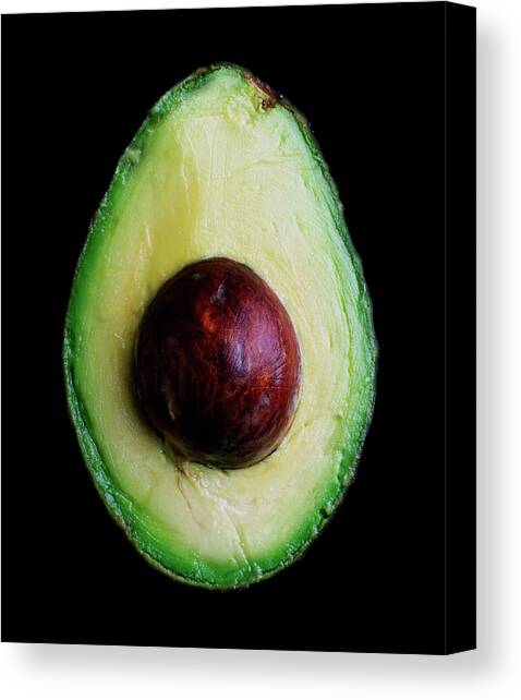 An Avocado Canvas Art Print by Romulo Yanes