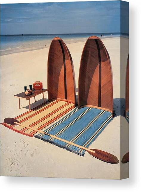 Pixie Collapsible Boat On The Beach Canvas Art Print by Lois and Joe Steinmetz
