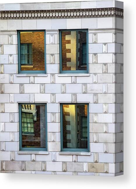 Sunset Reflections In Windows Canvas Art Print by Gary Slawsky