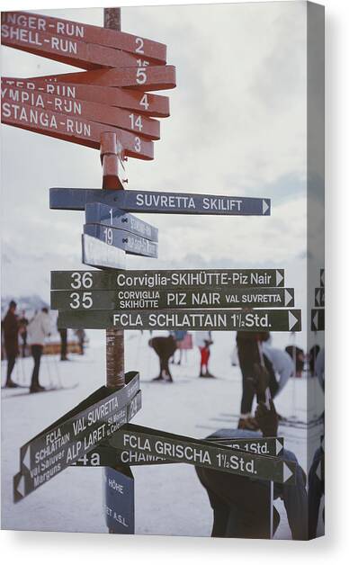 Signpost In St. Moritz Canvas Art Print by Slim Aarons