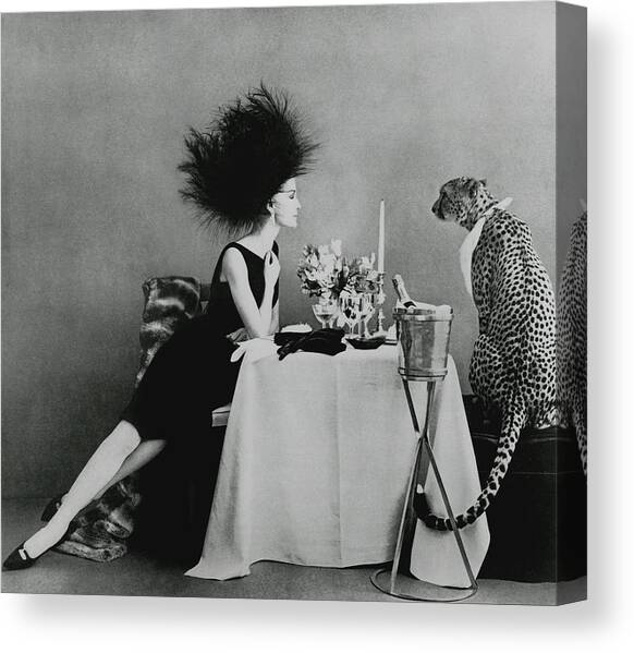 A Model With A Cheetah Canvas Art Print by Leombruno-Bodi
