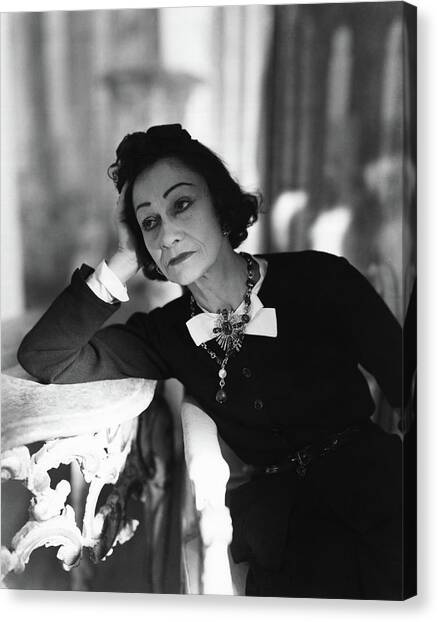 Coco Chanel Leaning On A Table Photograph by Horst P. Horst