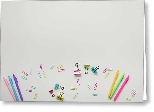 Rainbow Pens And Paper Clips On White Background Greeting Card by Cavan  Images