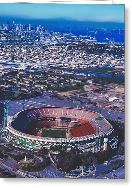 San Francisco 49ers Joe Montana and Nick Bosa city skyline