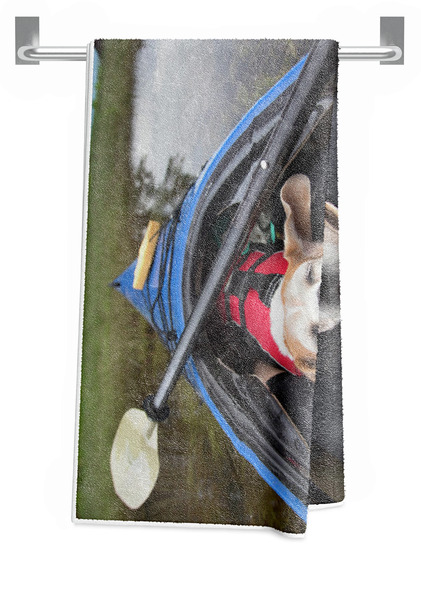 Close-up Of Dog Relaxing In Kayak Beach Towel