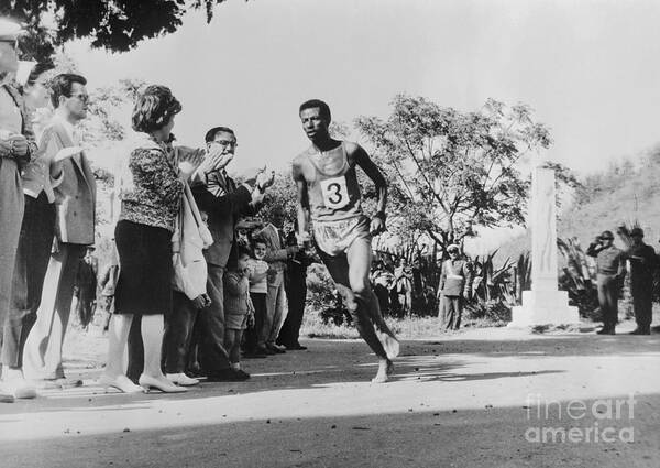 Abebe Bikilla Running In Marathon Poster by Bettmann