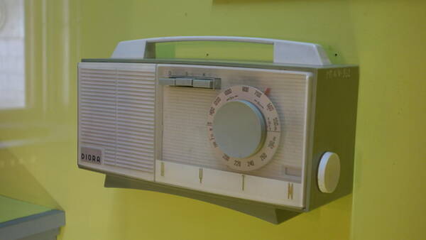 Wall Art - Photograph - Vintage Radio with Lime Green Background by Matthew Bamberg