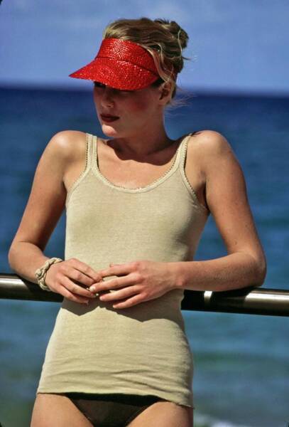 Wall Art - Photograph - Patti Hansen Wearing A Red Visor #3 by Arthur Elgort