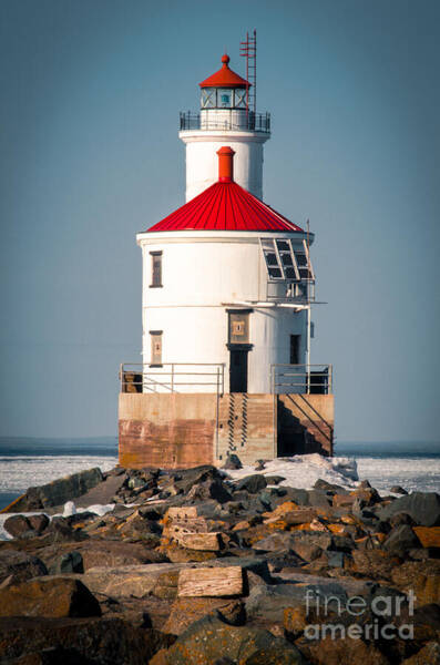 Lighthouse On The Rocks Art Print
