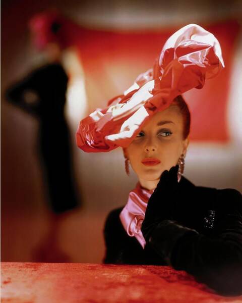 Wall Art - Photograph - A Model In A Suzanne Et Roger Hat by John Rawlings