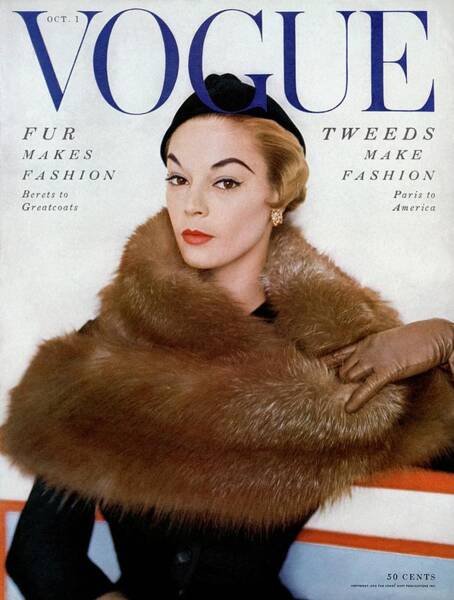 Wall Art - Photograph - A Vogue Cover Of Jean Patchett Wearing A Fur Wrap by Horst P. Horst