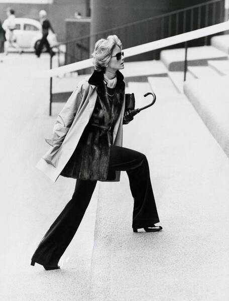 Wall Art - Photograph - Cheryl Tiegs Wearing A Silk Raincoat by Kourken Pakchanian