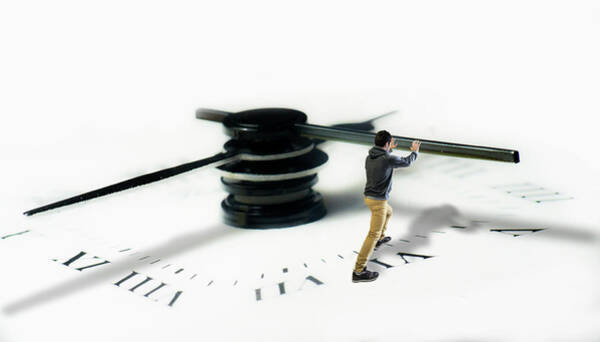 Man Turning Clock Hands Wall Art