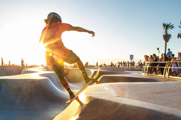  Photograph - Skateboarder with Sunflare by George Hobbs