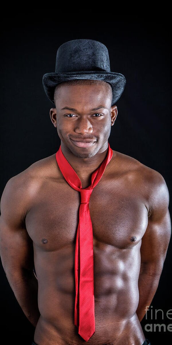Handsome black young muscle man naked, wearing only pants and necktie