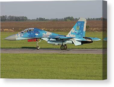 A Sukhoi Su-27 Flanker of the Russian Knights aerobatic team Solid-Faced  Canvas Print