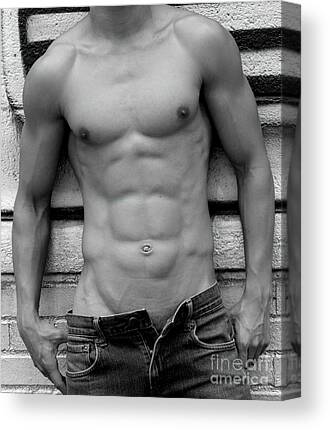 Attractive, muscular, and silly male model pulls down his pants