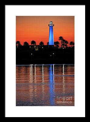 Lighthouse At Queensway Bay Framed Prints