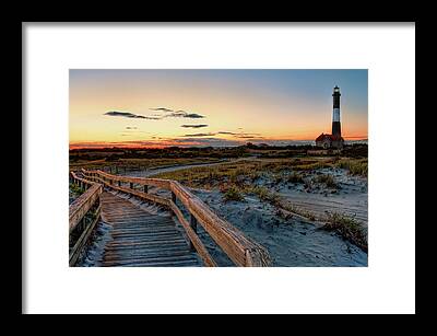 Lighthouse At Sunset Framed Prints