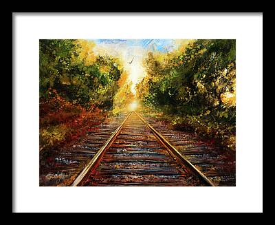 Sunset On Railroad Tracks Framed Prints