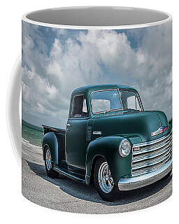 https://render.fineartamerica.com/images/rendered/search/frontright/mug/images/artworkimages/medium/1/fifty-one-chevy-3100-douglas-pittman.jpg?&targetx=150&targety=0&imagewidth=499&imageheight=333&modelwidth=800&modelheight=333&backgroundcolor=6D8D9E&orientation=0&producttype=coffeemug-11