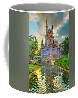 https://render.fineartamerica.com/images/rendered/search/frontright/mug/images/artworkimages/medium/2/cinderella-castle-and-magic-kingdom-florida-sunset-gregory-ballos.jpg?&targetx=289&targety=0&imagewidth=222&imageheight=333&modelwidth=800&modelheight=333&backgroundcolor=646B5C&orientation=0&producttype=coffeemug-11