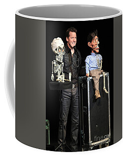 https://render.fineartamerica.com/images/rendered/search/frontright/mug/images/artworkimages/medium/3/jeff-dunham-achmed-the-dead-terrorist-and-achmed-junior-concert-photos.jpg?&targetx=285&targety=0&imagewidth=229&imageheight=333&modelwidth=800&modelheight=333&backgroundcolor=504E49&orientation=0&producttype=coffeemug-11