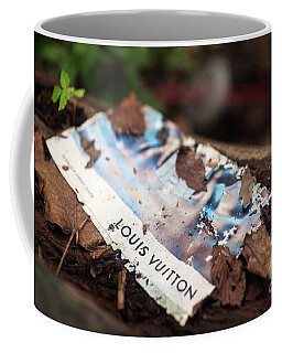 Puddle reflection of Louis Vuitton on Madison Avenue Coffee Mug by