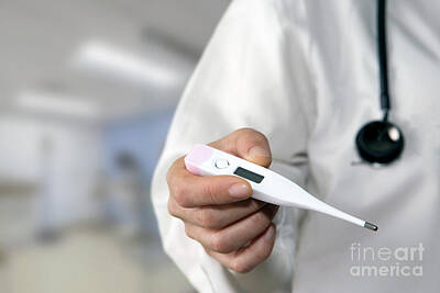 https://render.fineartamerica.com/images/rendered/search/poster/8/5.5/break/images/artworkimages/medium/2/1-doctor-holding-thermometer-digicomphotoscience-photo-library.jpg
