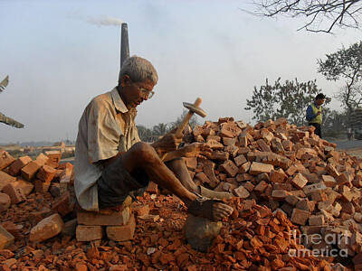 An Old Man Breaking Brick For A Loaf Of Bread Art