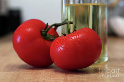  Photograph - Juicy red tomatoes with water droplets close-up waiting for salad by Doug Moore
