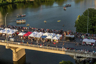  Photograph - Thousands of bat watchers gather on the Congress Avenue Bridge during the annual Bat Fest celebration to watch the 1.5 million bats take flight by Austin Welcome Center