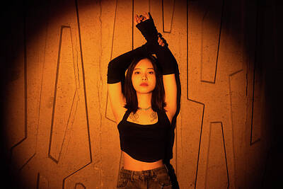  Photograph - Young Chinese woman portrait in a spotlight by Philippe Lejeanvre